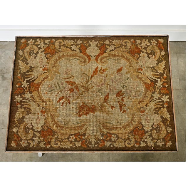 Dimensions: 27” H x 29 ¾” W x 22 ⅝” D This captivating French 19th century Louis XV-style tea table or side table features...