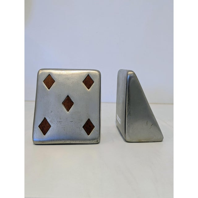 Bookends designed by Kenji Fujita for Jenfredware's Maison Gourmet line, produced in California during the 1960s. Cast...