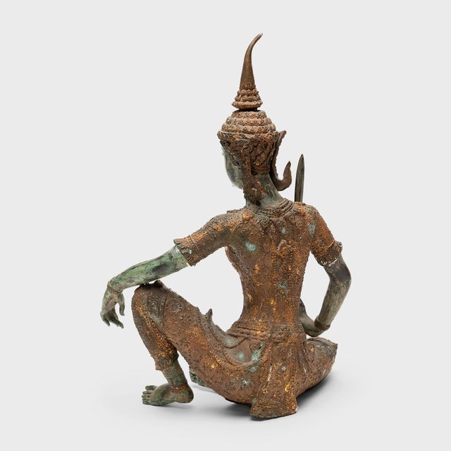 Cast with graceful proportions and intricate detail, this bronze figure of a princely warrior is a lovely example of...