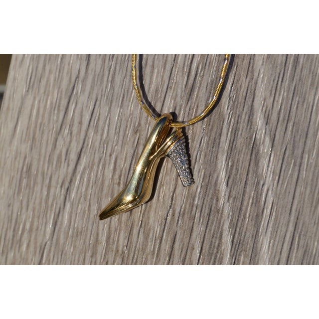 The Aurelia Ladies 14K Two Tone Gold and Diamond Heel Necklace. Crafted in 14 karat yellow gold, this contemporary ladies...
