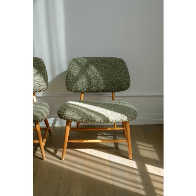 Alf Svensson TeVe lounge chairs in grey boucle by Ljungs Industrier AB Sweden, 1953. In good vintage condition with some...