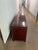 This is a stunning solid rosewood credenza. It features carved Asian symbols into the wood for pulls. There is a central...