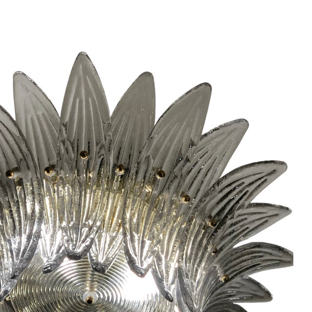 Pair of Palmette-style Murano glass ceiling lights by Barovier & Toso. Original design from the 1950s. Each tier features...