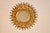 Mid-20th-century sunburst mirror from France. The sunburst edges of the frame have a great shape and almost a wavy-edged...