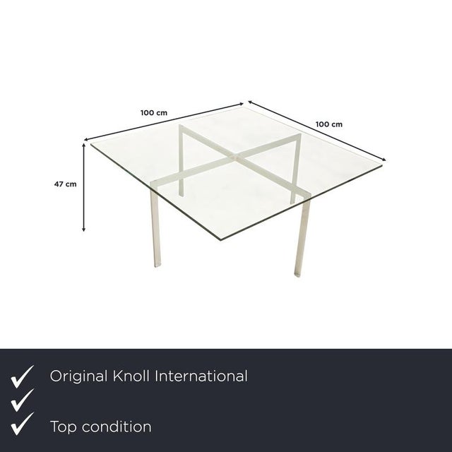 The Barcelona table by Knoll International is made of thick crystal glass and stands on a chrome-plated frame. This glass...