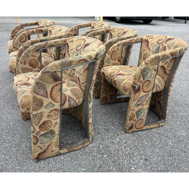 6 Elegant and cool sculptural lines, metal inserts make these chairs beautiful from all sides. There is a small tear on...