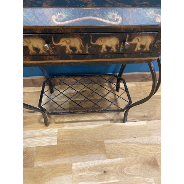 This vintage painted side table by Collezione Europa features a whimsical elephant motif and a single drawer for storage,...