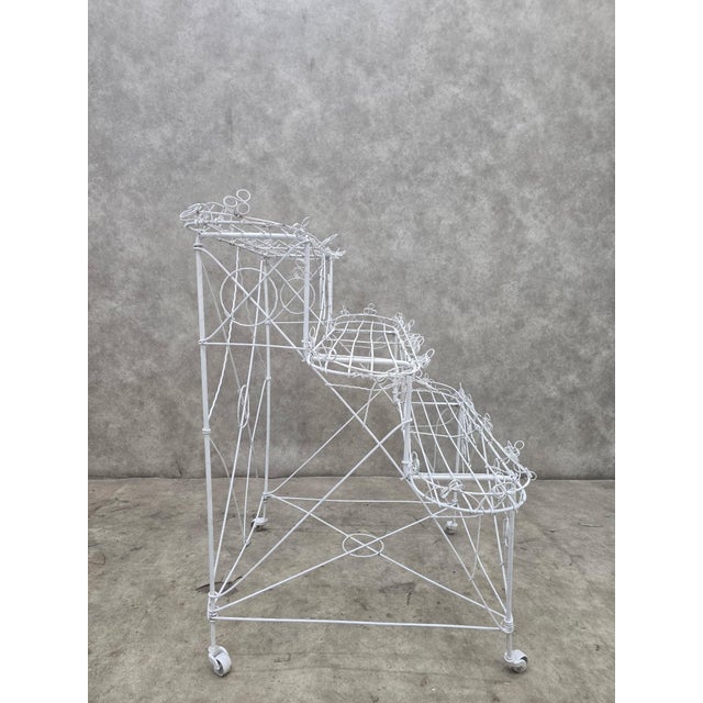 Vintage White Wire 3-Tier Rolling Plant Stand on Casters A charming vintage white wire plant stand featuring three...