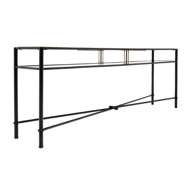 Console table from mid-century Italy. This piece is made of forged iron with a cream colored marble top. The curved...