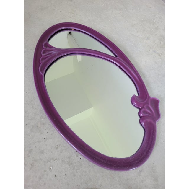 Set consisting of a 49x30 cm mirror and a 35x29x17 cm towel rack Enameled cast iron Art Nouveau period
