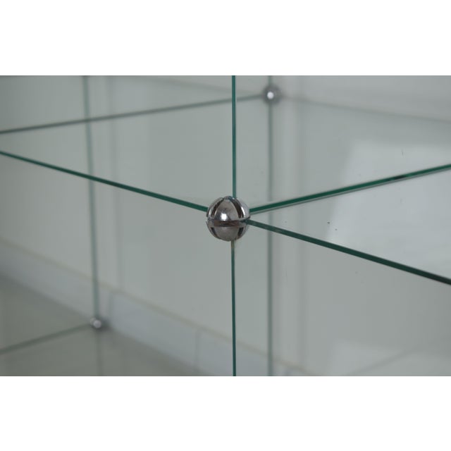 Italian modular bookcase from the 1970s, an expression of the rational and lightweight design typical of the period. Made...