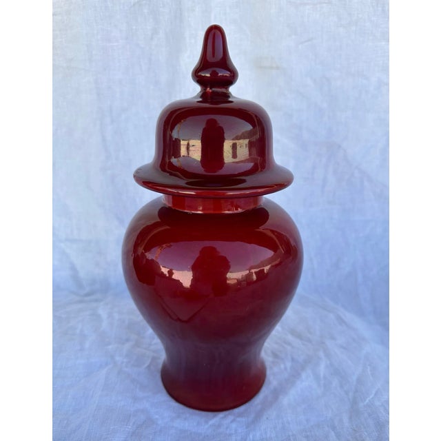 Beautiful Burgundy Ginger Jar, perfect for display on a entry table. 12.5in h x 6 I also have a navy blue and yellow one...