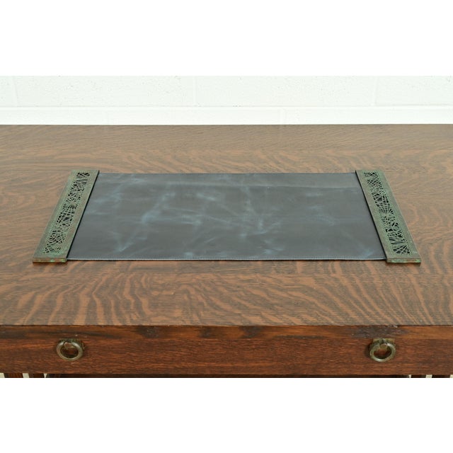 A gorgeous pair of Art Deco or Arts & Crafts period bronze blotter ends in the "Pine Needle" pattern, with a custom blue...