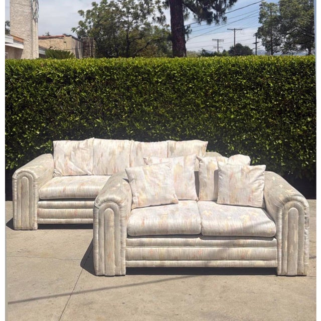 Absolutely stunning post modern vintage sofa set! Long beautiful sofa with a matching love seat and matching throw...