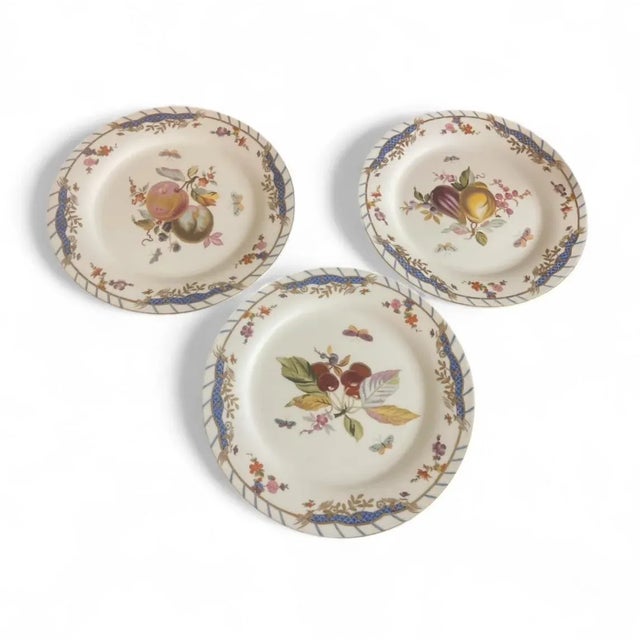 Bring a touch of classic, garden-inspired charm to your home with this lovely set of three decorative plates by Chelsea...