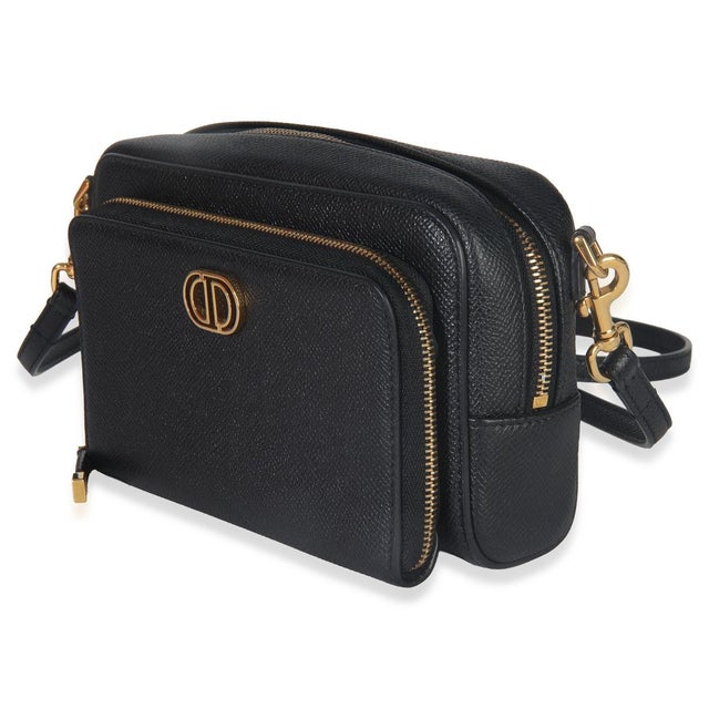 Item #: 151098 Interior Material: Microfiber Dimensions: 7.5 x 4.5 x 2.25 in Handbag Closure Type: Zip-Around Strap...