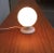 Small ball table lamp from the renowned manufacturer Kaiser Leuchten. Simple design with special details. The base has a...