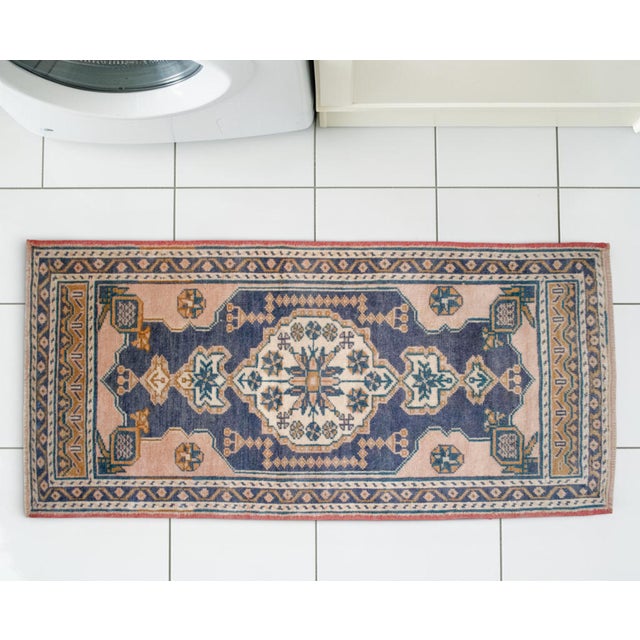 Presenting a remarkable vintage Anatolian textile, a petite yet profoundly expressive foundation piece curated for the...