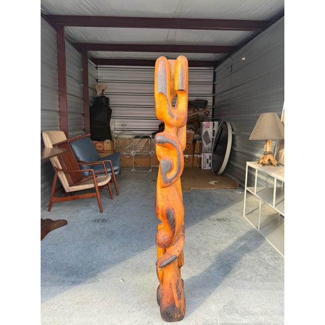 Very special and unique mid-century modern tall carved hard wood sculpture with intricate shapes. Ideal for any...