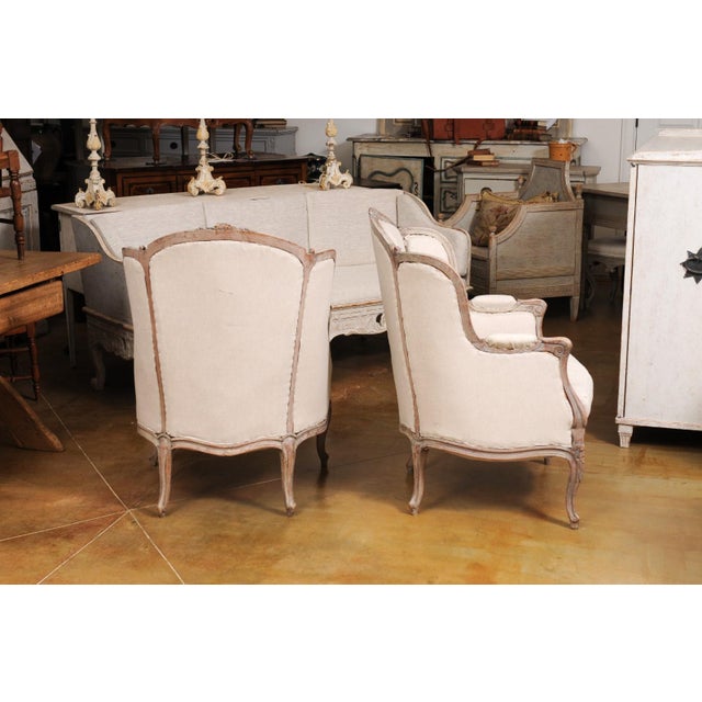 French Louis XV Style 1880s Painted Bergère Chairs with Carved Floral Motifs - A Pair For Sale - Image 10 of 12
