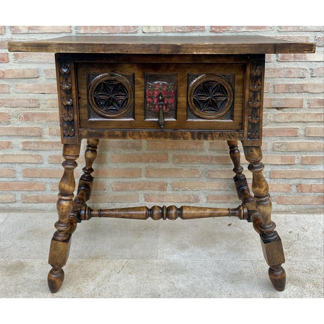 Beautiful walnut desk or side table from the 19th century Spanish Baroque with carved structure, solomonic legs and one...
