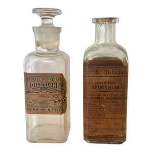 Pair of Antique Apothecary Bottles – Boericke & Tafel “Arnica 3x” and Lloyd Brothers “Colloidum Apocynum”