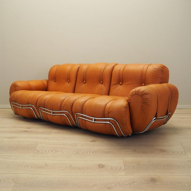 The sofa was made in the 1960s, Italian production. The structure is made of metal. The sofa is preserved in its original...