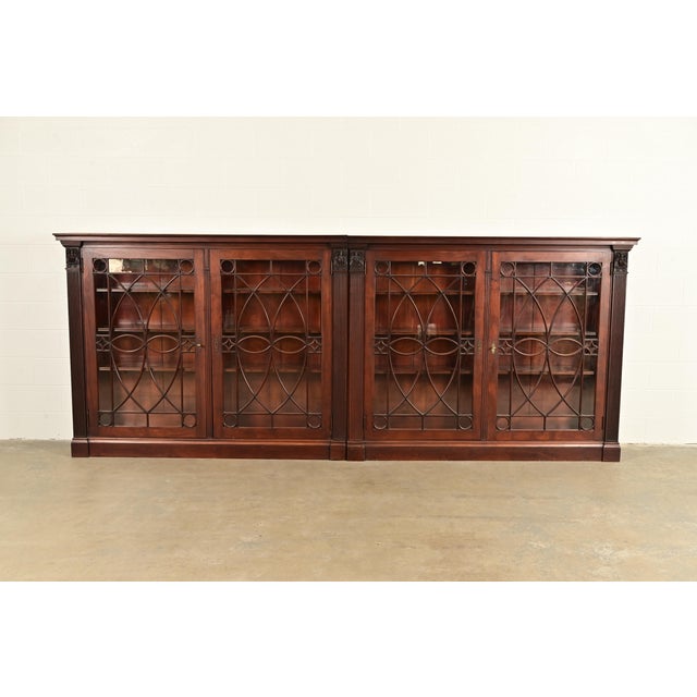 An outstanding monumental antique American Empire or Federal style quadruple bookcase cabinet In the manner of R.J. Horner...