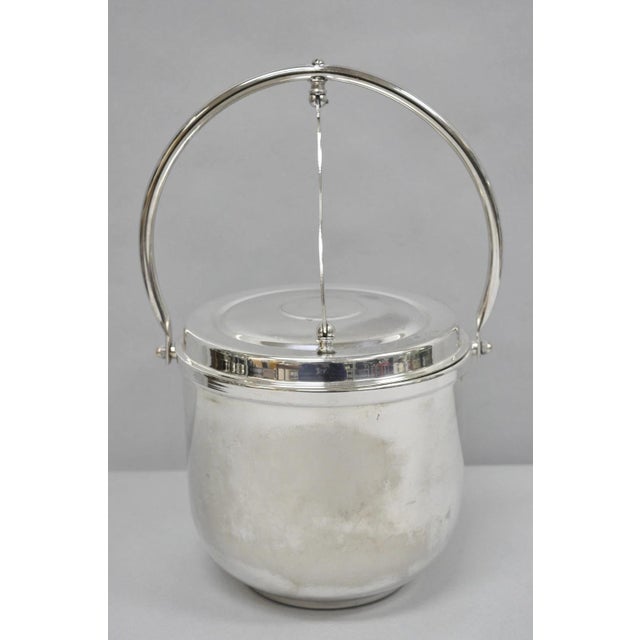 Vintage Art Deco Silver Plated Reticulating Hinge Bar Ice Bucket with Glass Liner by Towle. Circa Late 20th Century....