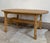 Bring a striking piece of Scandinavian design into your home with this exceptional 1970's Danish oak dining table, heavily...