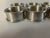 Vintage set of 8 stainless monogram "R" napkin rings 2"R X 1"H no makers mark, in excellent condition.