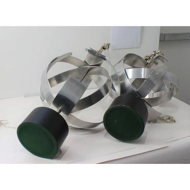 Stylish Armillary shaped table lamps. Each one is styled slightly differently in this modernist abstract almost industrial...