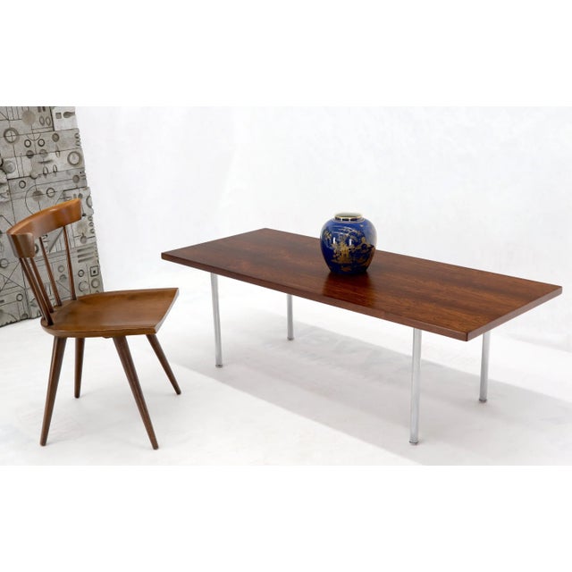 Mid-Century Modern rosewood rectangular coffee table by Hans Wegner. This item includes restricted materials and can not...