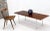 Mid-Century Modern rosewood rectangular coffee table by Hans Wegner. This item includes restricted materials and can not...