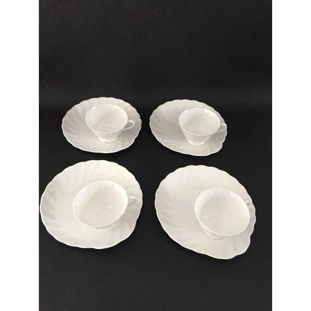 Vintage elegant bone china show white set of four snack sets, maker's mark reads, " Royal Tuscan Fine Bone China Made in...