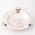 This Art Deco Hand-Hammered Ashtray W/Inset Sculptural Coins, crafted in Peru in the 20th century from .900 sterling...