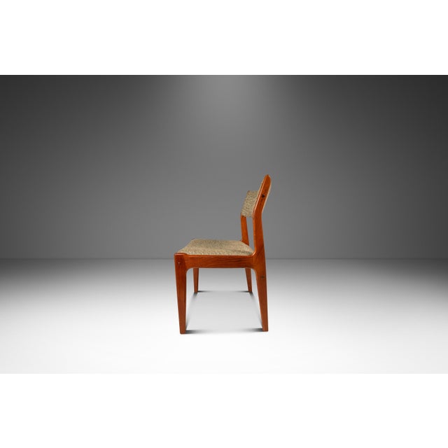 This refined Danish Mid-Century Modern dining or desk chair by Scandinavia Woodworks Co. exemplifies the minimalist...