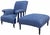 Antique English-style upholstered armchair and oversized ottoman with an unusually sculptural silhouette. The chair...