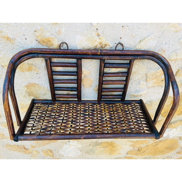 Mid century, vintage wall shelf circa 1960s. The overall structure is made of bamboo, featuring a beautiful, fluid, sleek...