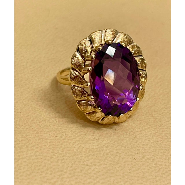 Approximately 10 Carat Checker board Amethyst Cocktail Ring in 14 Karat Yellow Gold Size 6.5 This is a Beautiful Cocktail...