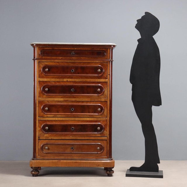 Mahogany chest of drawers. The front features six drawers, the first, lowest, in the lower section. Cherry and poplar...