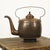 Exceptionally large red copper teapot from the 19th century, hand-finished with a hammered effect. The rich, weathered...