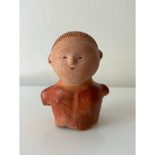 Handmade clay sculptural figure. This little person is quite interesting, whether repesentative of a Kabuki character or...