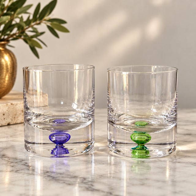 A striking pair of vintage Polish handblown glass tumblers, attributed to Krosno, circa 1980s–1990s. With substantial...