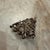 For your consideration, a wire-wrapped pendant featuring a raw gemstone, specifically resembling a clear or rutilated...