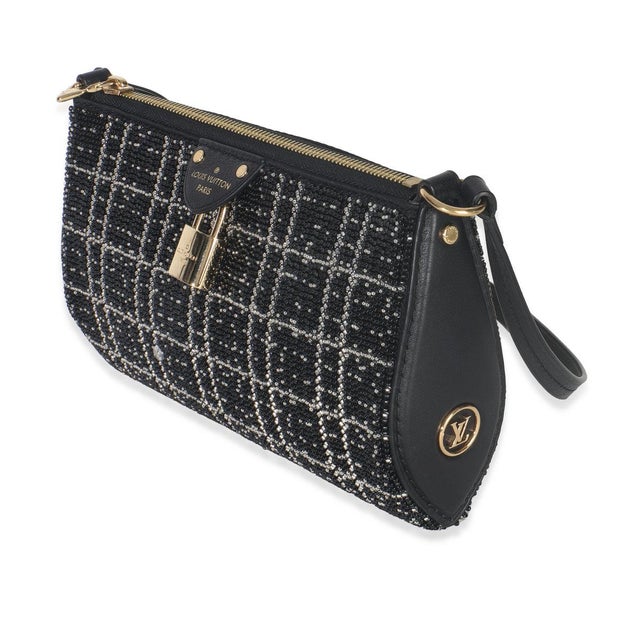 Comes with papers. Item #: Z150695 Exterior Material (Specific): Beads MSRP: 3,600 Interior Material: Leather Dimensions:...
