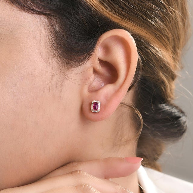 Timeless Octagon Cut Ruby Diamond Halo Stud Earrings Gift in 14K Gold to make a statement with your look. You shall need...