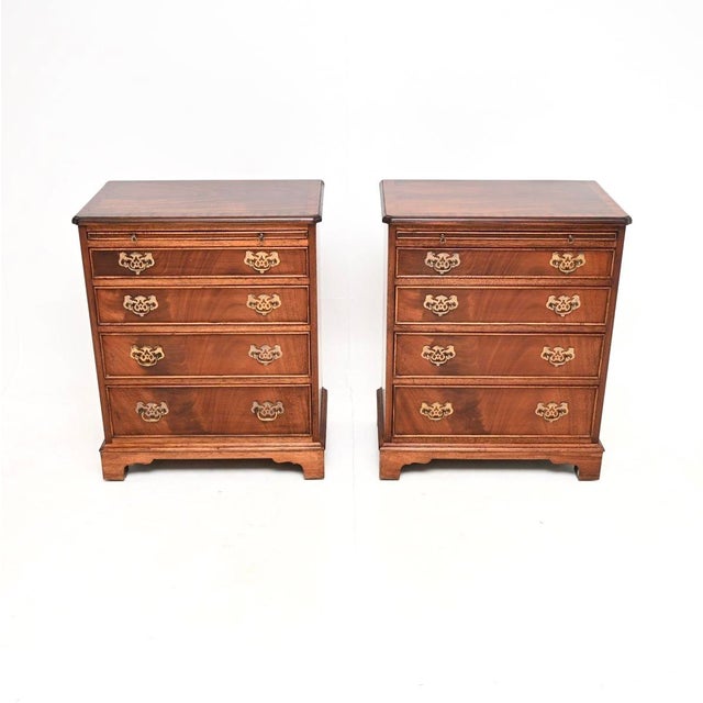 A beautiful pair of antique chests of drawers in the Georgian style. They were made in England, they date from around the...