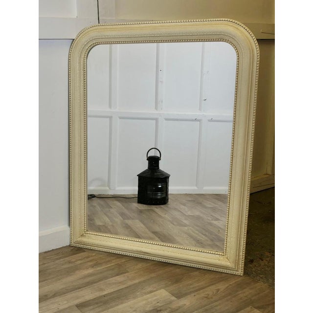 A Tall Crackle Finish Painted Overmantel Mirror This is a Striking piece it has a rectangular shape with curved corners at...