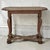 A beautiful 18th century Country French oak side table with a wonderfully aged surface, elegant carved base and remarkable...